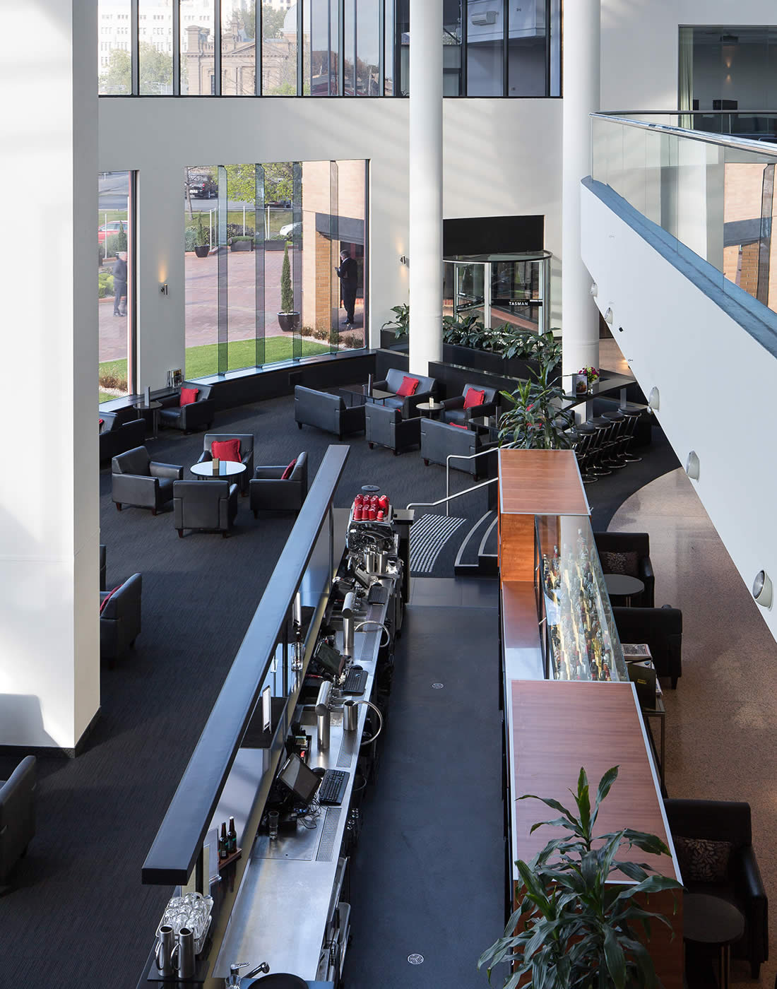 Hotel Grand Chancellor main foyer bar, Hobart: Streamlined service, rationalised movement paths and the reconfigured spatial layout has significantly improved access, use and returns. Photo by Thomas Ryan.