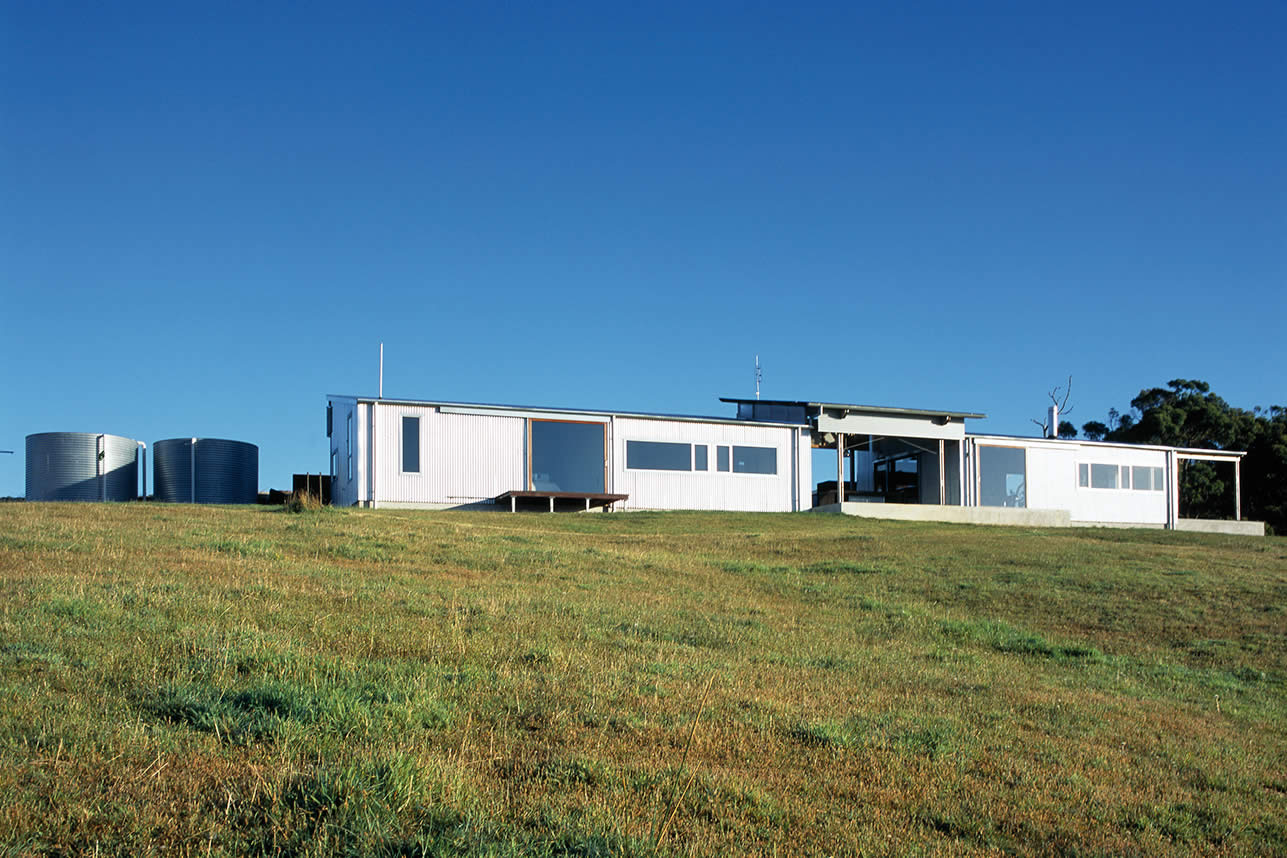 House Byrne, South Gippsland, Victoria: The house form and architectural language is derived from that of the modern-day agricultural shed using rough sawn timber and galvanised corrugated iron in this rural landscape. Photo by Richard Gange.