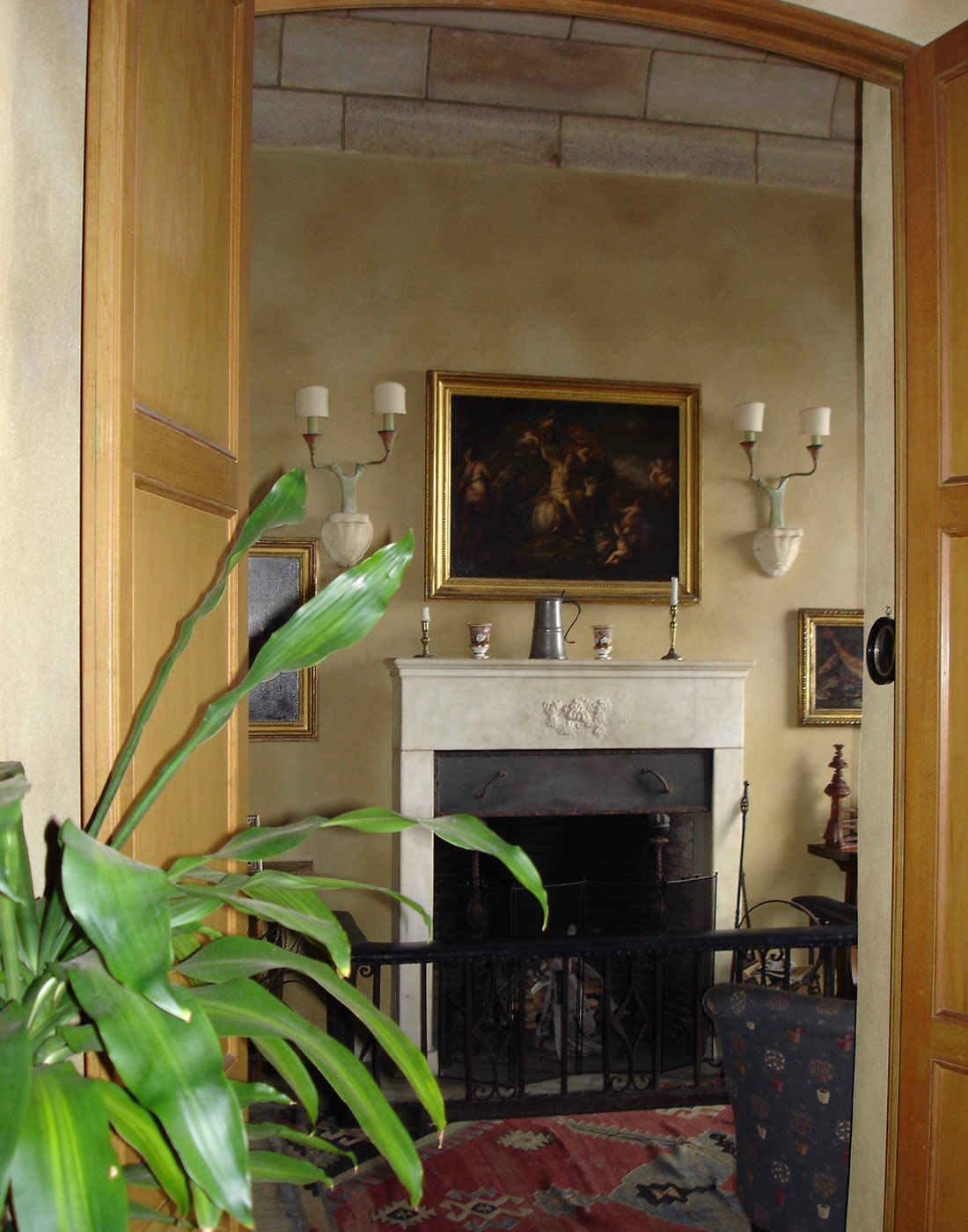 Library Fireplace Insert, the James House, Carmel Highlands, California: Morrison & Breytenbach Architects designed the wrought iron panel insert to improve the draw of the Library fireplace by Charles Greene.  