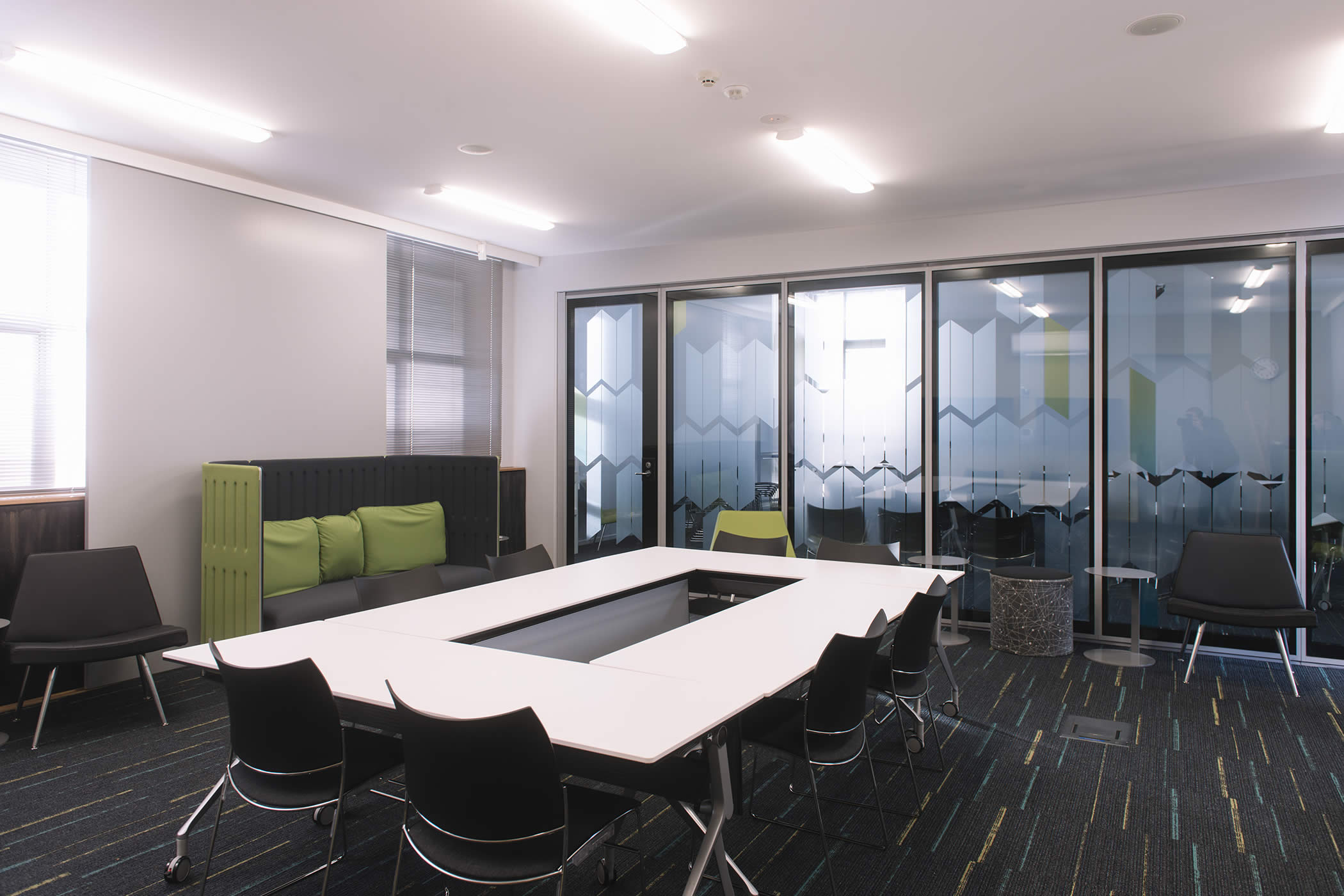 Professional Learning Institute, Goodwood, Tasmania: Acoustically rated, glazed operable walls link or divide the interior space for flexible use, while patterned glazing affords appropriate visual separation and connection. Photo by Jonathan Wherrett.