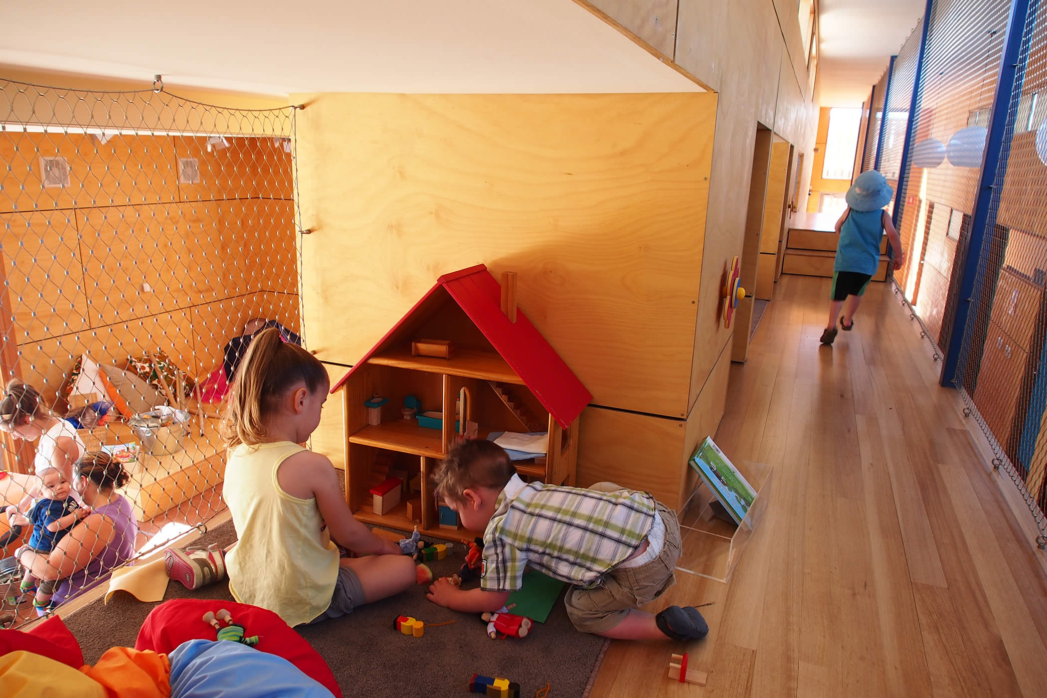 Ptunarra Child and Family Centre, New Norfolk, Tasmania: High levels of visual connection and passive surveillance of the children enables parents to socialize and participate in community and training programs.  Photo by Yvette Breytenbach.