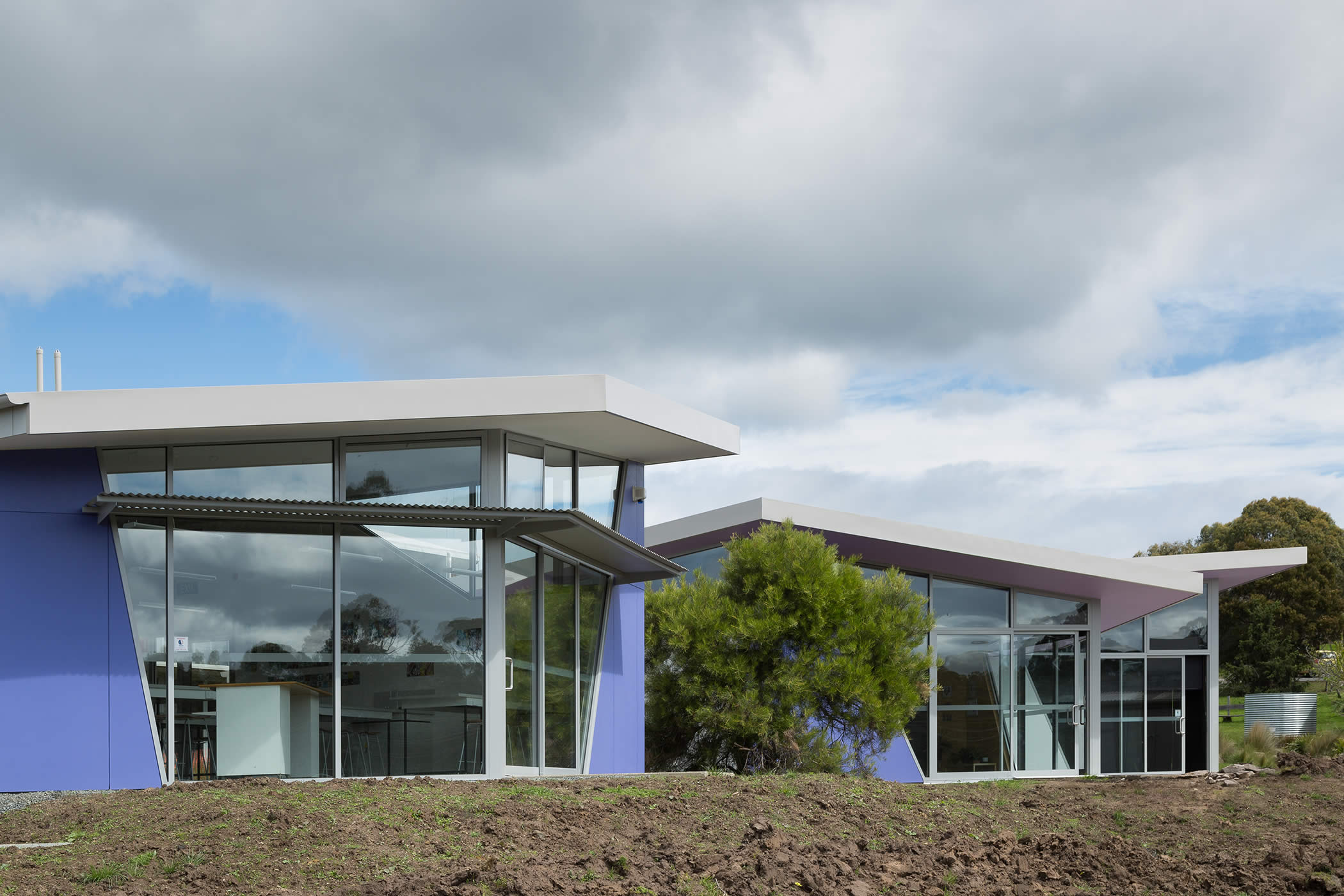 Tarremah Steiner High, Kingston, Tasmania: The general learning areas and art–science lab design uses angular geometries, glazing and colour to create engaging Steiner learning space and for passive solar warmth and daylight. Photo by Thomas Ryan.