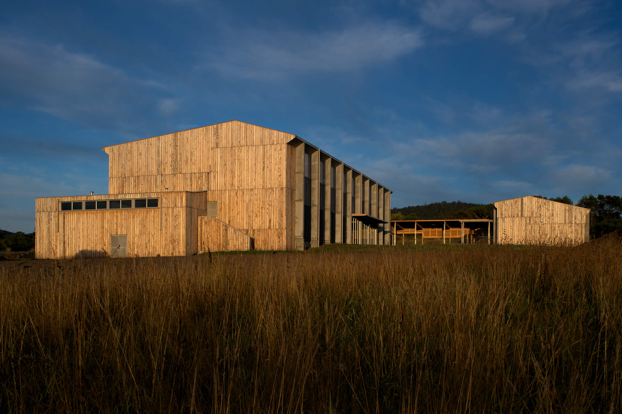 Tarremah Steiner School Hall, Huntingfield, Tasmania: The hall initially stood as a lone sculptural ‘object in the landscape’ anticipating the subsequent development of the high school around it. Photo by Ray Joyce.