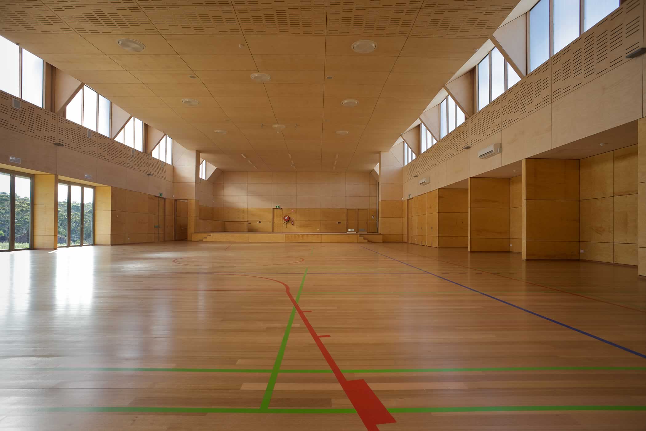 Tarremah Steiner School Hall, Huntingfield, Tasmania: Interior spans and use of natural timbers demonstrate innovation in the environmentally sustainable structural system, materials and detailing. Photo by Ray Joyce.