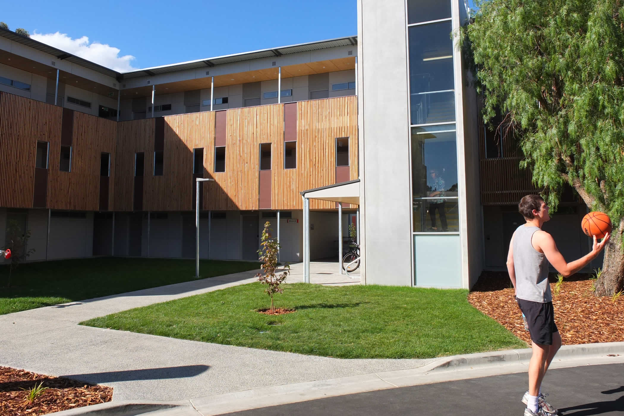 UTAS Newnham Student Residences, Tasmania: The social amenity of the courtyards supports active student use with attendant benefits to atmosphere and safety through passive surveillance of outdoor space. Photo by Morrison & Breytenbach Architects.