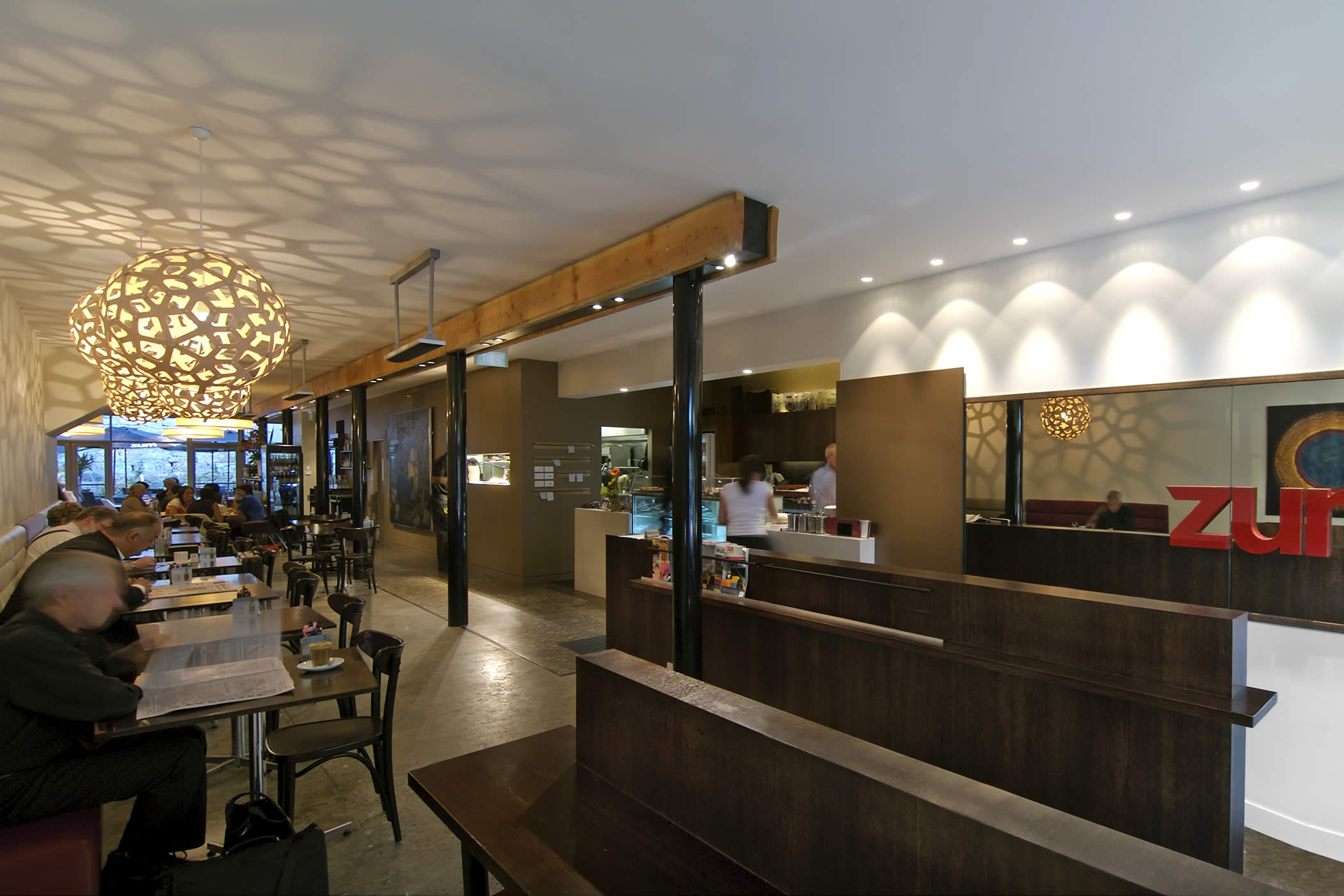 ZUM Cafe, Salamanca Place, Hobart: A highly functional and efficient layout in a restricted linear space creates distinct zones, varied ambience and a separate circulation spine opening to a quarry courtyard at the rear. Photo by Jonathan Wherrett.